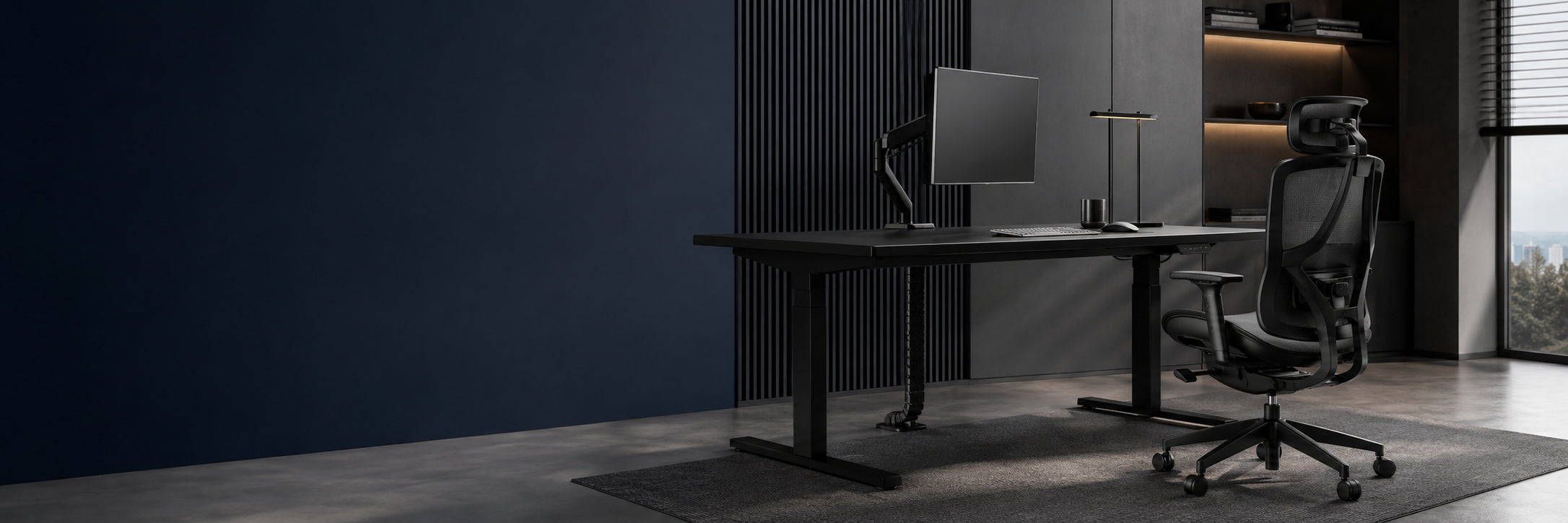 Modern Furnitech height-adjustable desk and ergonomic office chair in a dark, organized home workspace